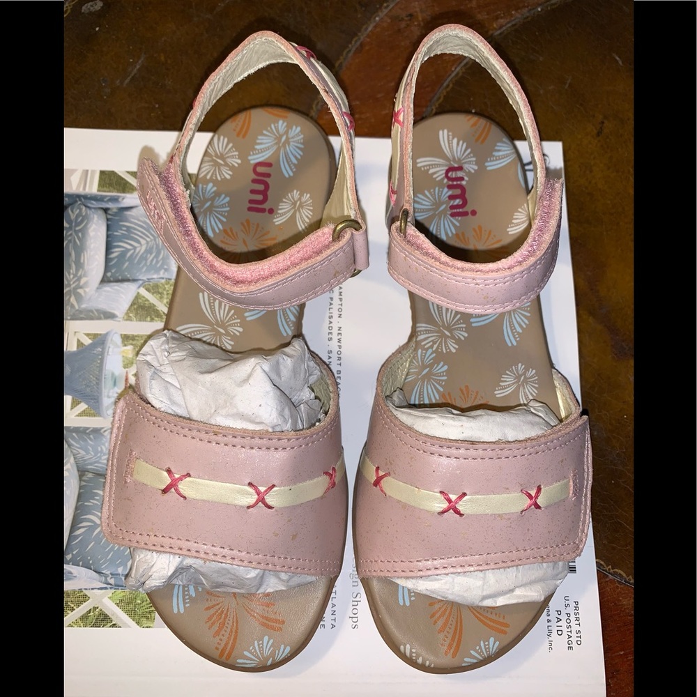 UMI girls size 1.5 pink leather with classy off white trim. Worn lightly.